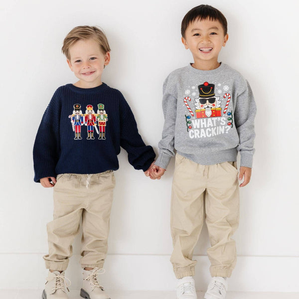 Sweet Wink Nutcracker Patch Christmas Sweater