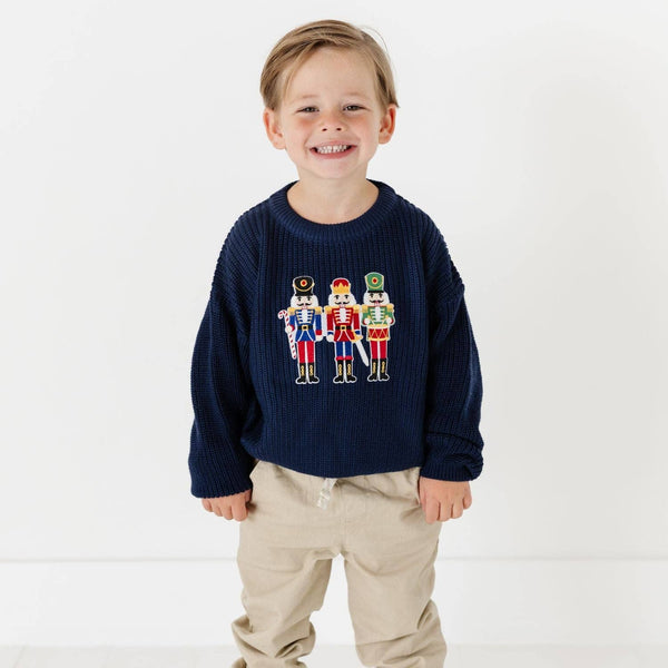 Sweet Wink Nutcracker Patch Christmas Sweater